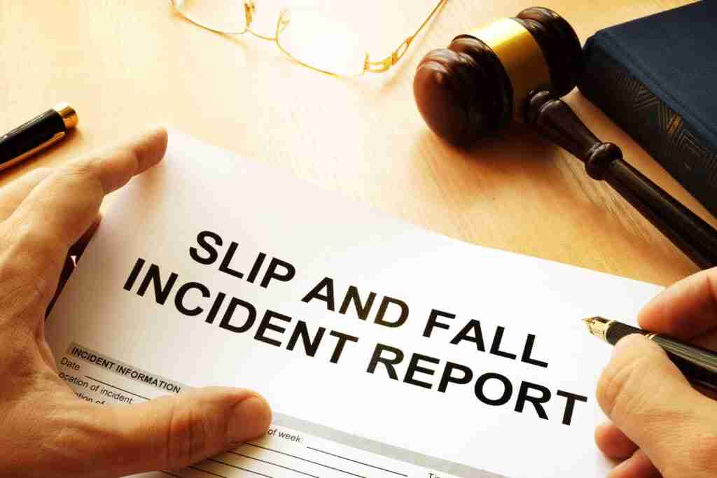 Slip and fall injury report on a table.