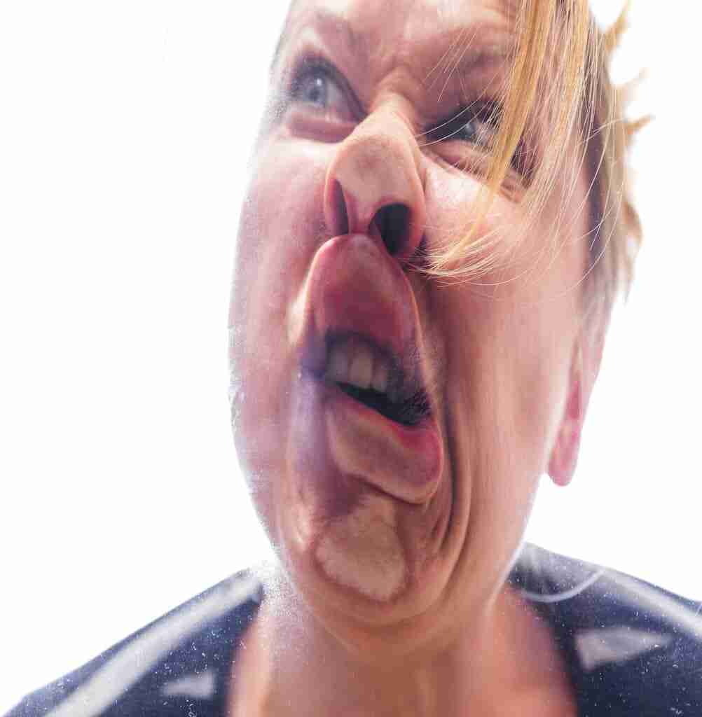 Woman Is Running Against A Pane