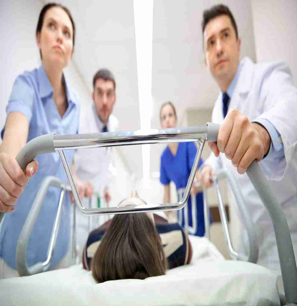 Profession, people, healthcare, reanimation and medicine concept – group of medics or doctors carryi